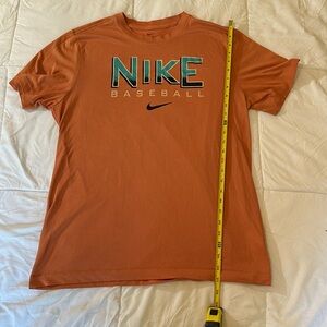 ✅The NIKE TEE DRI-FIT shirt. Baseball. Soft orange color w/graphics. Men’s LARGE